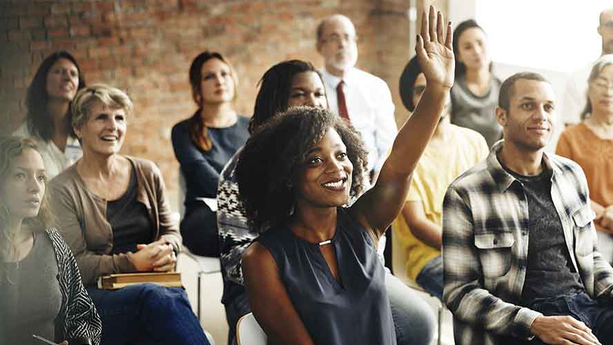 adult students in an interactive classroom chat